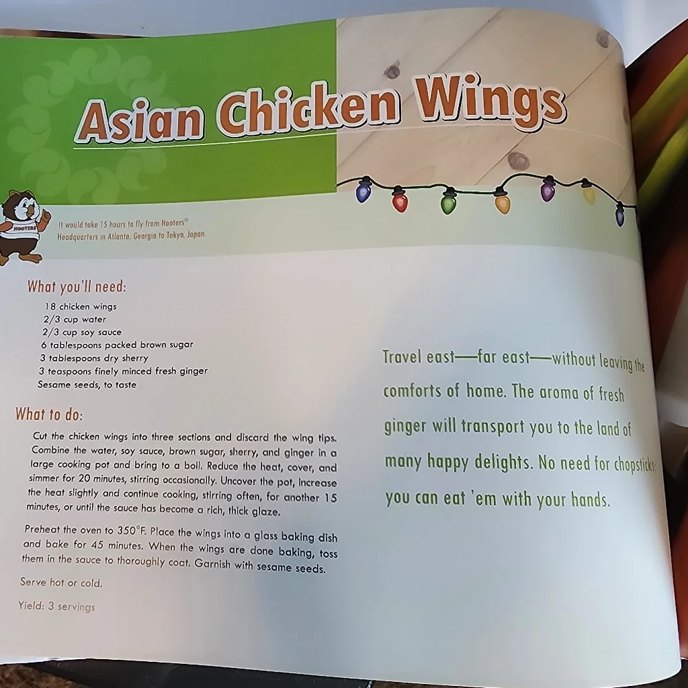 Hooters Cookbook with Orange and Blue Accents
